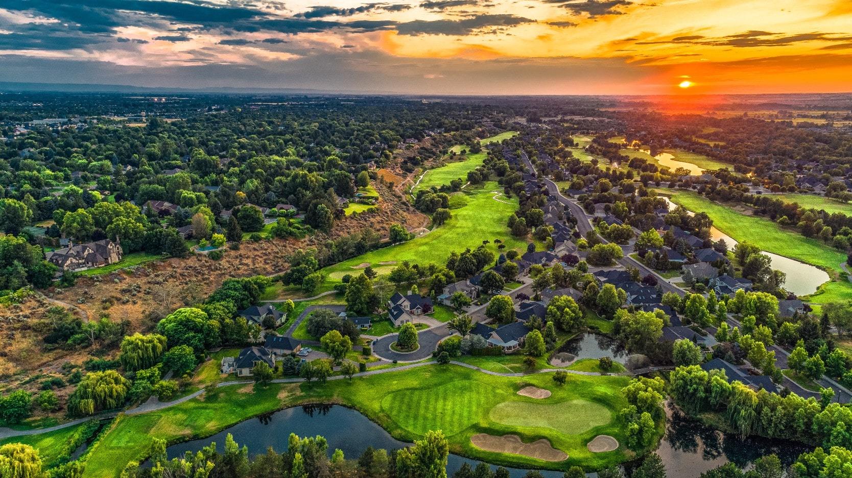 Sunset over a golf course in Northwest Boise with real estate along the greens